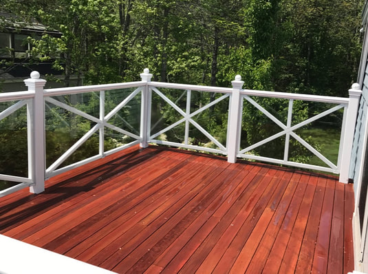 Finished w/ Mahogany color stain on cedar decking.